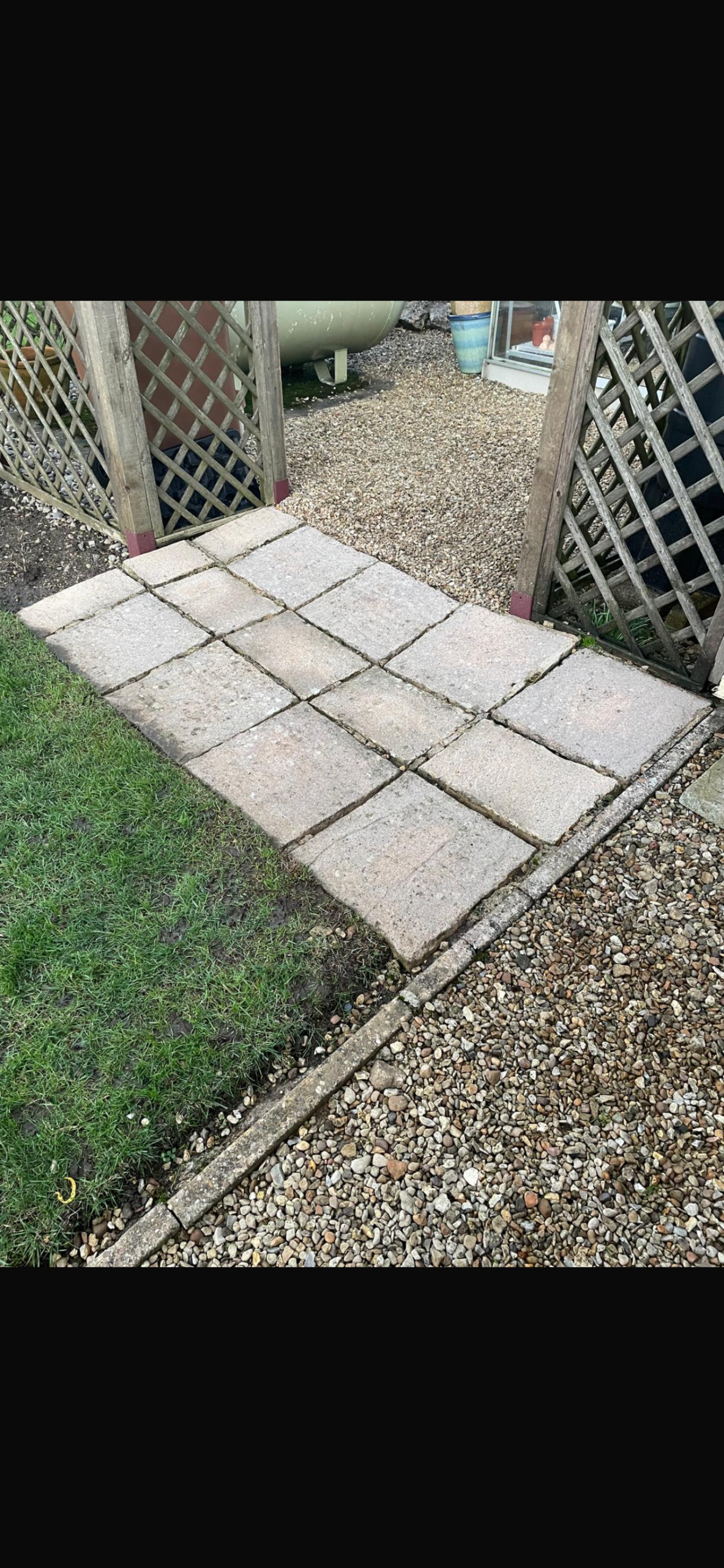 Exterior cleaning before service - dirty outdoor surface requiring professional pressure washing
